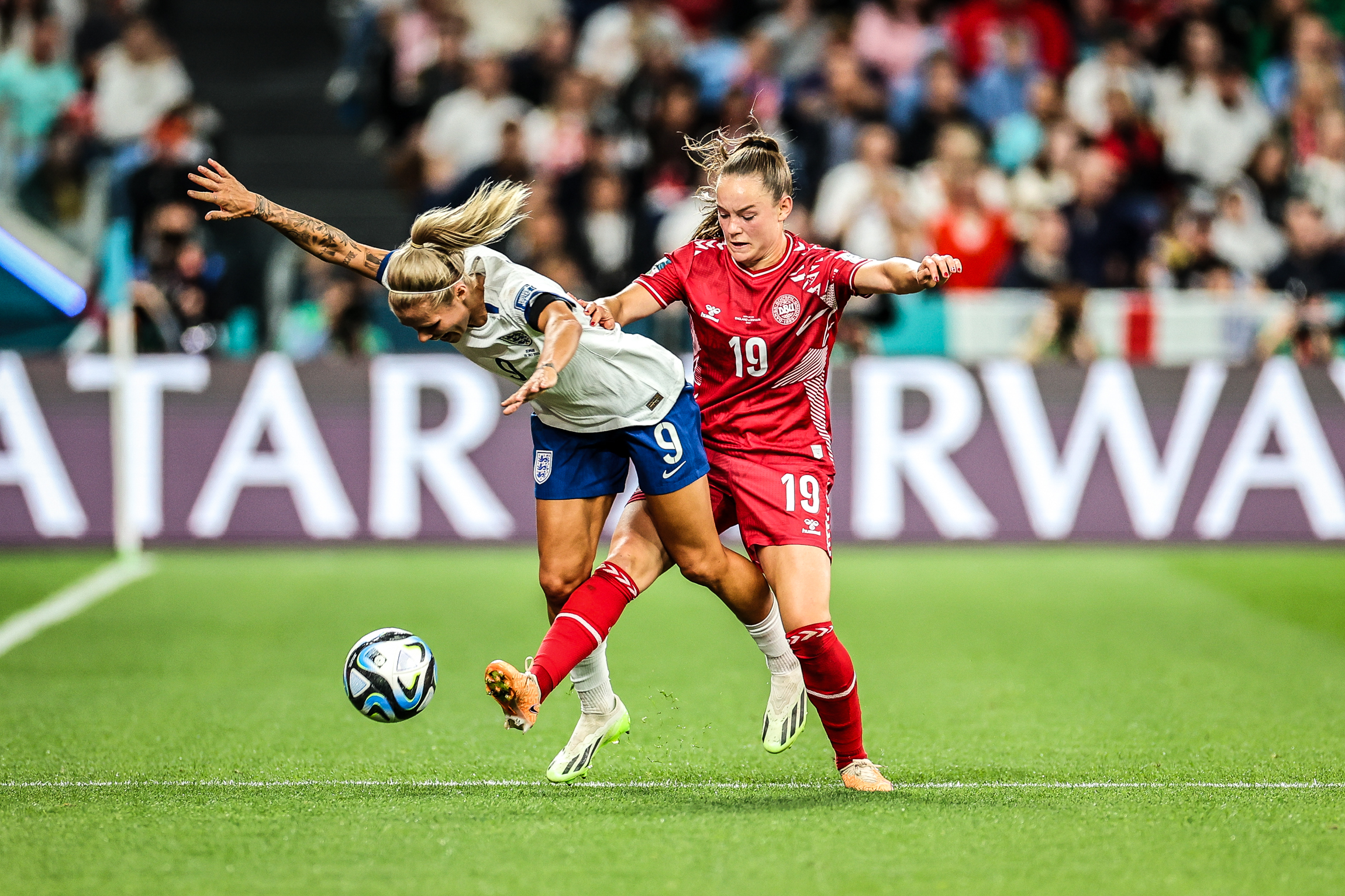 SYDNEY, AUSTRALIA - JULY 28: Janni Thomsen of Denmark and Rachel Daly of England in action during the FIFA Women's World Cup Australia & New Zealand 2023 match between England and Denmark at Sydney Football Stadium on July 28, 2023 in Sydney, Australia.