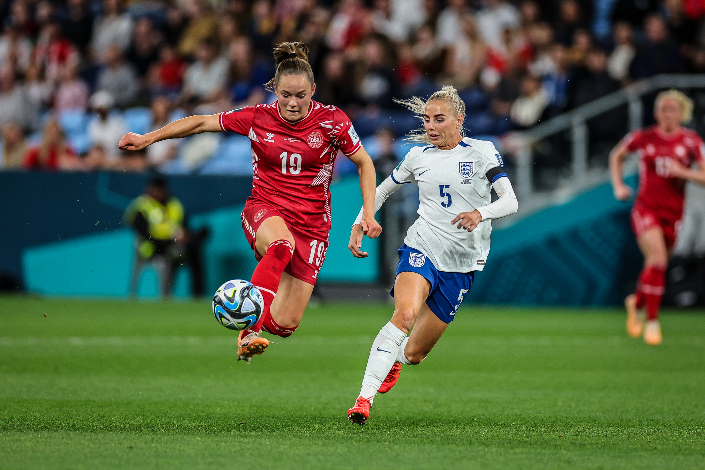 SYDNEY, AUSTRALIA - JULY 28: Janni Thomsen of Denmark and Alex Greenwood of England in action during the FIFA Women's World Cup Australia & New Zealand 2023 match between England and Denmark at Sydney Football Stadium on July 28, 2023 in Sydney, Australia.